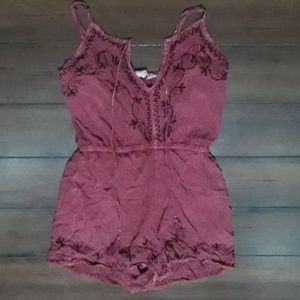 Cute purple romper. Size S